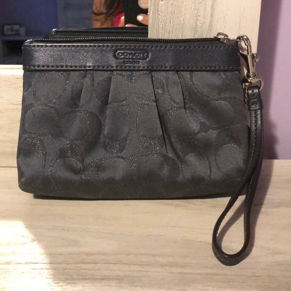 Gray coach wristlet.